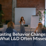 Facilitator guiding a diverse team during a leadership development session, reinforcing the concept of lasting behavior change in L&D